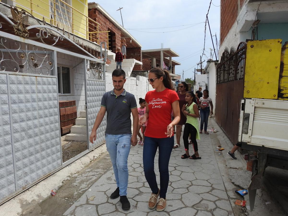 Veronika walking Roma kids to the community center of ADRA Albania